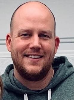 Board Director Garrett Carlson